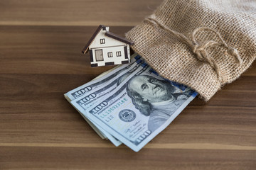 Real estate and mortgage investment. House on the hand.