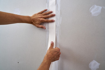laminated plasterboard plastering join tape - obrazy, fototapety, plakaty