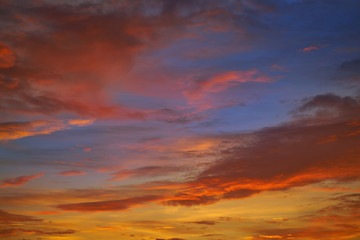 Sunset sky clouds orange and blue