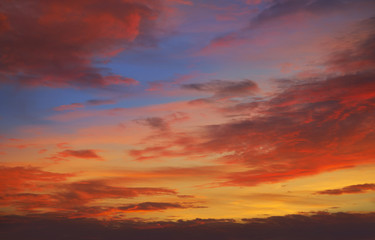 Naklejka na ściany i meble Sunset sky clouds orange and blue