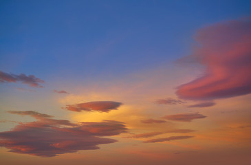 Sunset sky clouds orange and blue