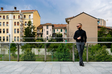 Man drinking a whiskey in Milan