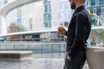 Naklejka premium Man drinking a whiskey in Milan