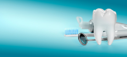 White big healthy tooth and different tools for dental care, on gradient dental background. banner...