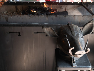 creepy metallic pig mask for tortures at grill bar