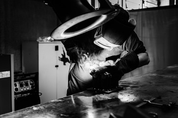 welder worker at work at a metalworking company