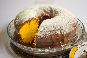 Chocolate Cake on a glass plate in the white table