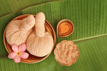 Ayurvedic herbal pads for massage on banana leaves 