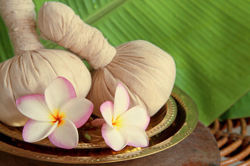 Ayurvedic herbal pads for massage on banana leaves 