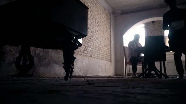 A rich old man in his castle considers old money, old times of the beginning of the 20th century, a wealthy, bearded man inside an old gloomy house, a cinematic picture, a mysterious castle of writer