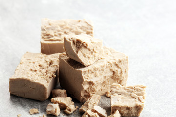 Dry yeast crumbled and yeast block for baking