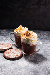 Hot chocolate cocoa with whipped cream for xmas on table