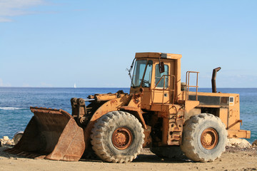 A bulldozer and a panoramic view of the Mediterranean sea from the Limassol seafront
