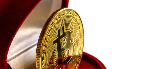 Coin bitcoin in a gift box for a ring or jewelry the concept of crypto currency the best gift