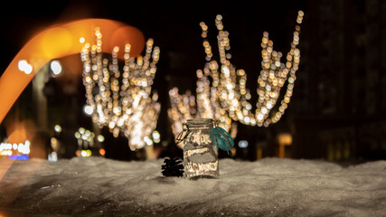 Flames of Bengal fire on the streets of the night city