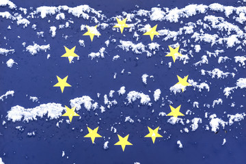 snowy European Union flag, weather forecast, close-up