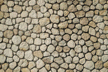 Beautiful accurate textured brick wall on bright sunny day.