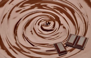 Melted chocolate swirl with bars / melting chocolate / chocolate swirl