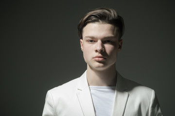 In his own style. Beauty and fashion. Hair style and skincare. Man with trendy look. Fashion man with mystery look. Modern male. Confident in his style. Young and free