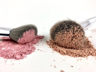 Powdered makeup and brushes