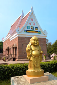 Golden Buddha statue at Wat Thai Sarnath Temple in Sarnath, India