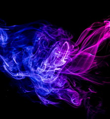 Colored smoke on black background