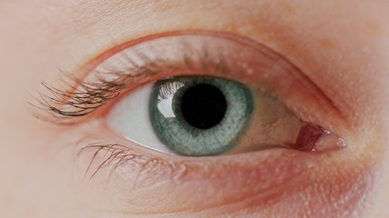 Fototapeta premium close-up macro eye opening human iris natural beauty