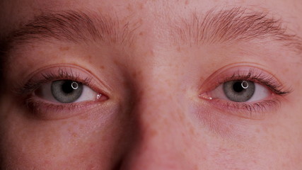 Fototapeta premium close-up beautiful blue eye opening human iris macro natural beauty