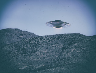 Unidentified flying object UFO. Old style photo with high ISO noise and dirt with scratches over time. Clipping path included.