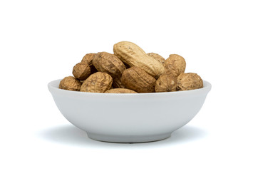 withe bowl with peanut with peel