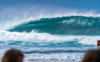 Perfect and beautiful barrel giant wave on beautiful blue ocean of Pipeline beach, oahu island, hawaii