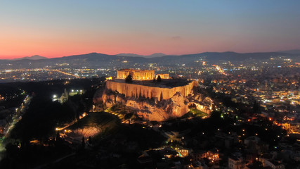 Obraz premium Aerial drone detail night shot of iconic Acropolis hill and the Parthenon a masterpiece of ancient Western civilisation, Athens historic centre, Attica, Greece