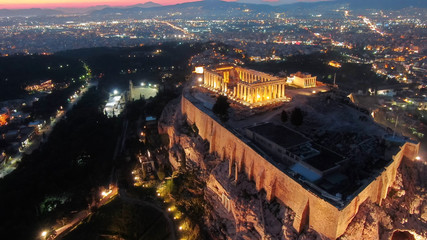 Aerial drone detail night shot of iconic Acropolis hill and the Parthenon a masterpiece of ancient...