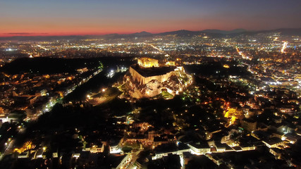 Fototapeta na wymiar Aerial drone detail night shot of iconic Acropolis hill and the Parthenon a masterpiece of ancient Western civilisation, Athens historic centre, Attica, Greece