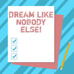 Writing note showing Dream Like Nobody Else. Business photo showcasing Have mote motivation inspiration than others Stack of Different Pastel Color Construct Bond Paper Pencil