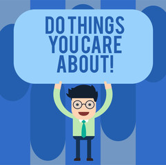 Writing note showing Do Things You Care About. Business photo showcasing Make actions oriented to your desires Motivation Man Standing Holding Above his Head Blank Rectangular Colored Board