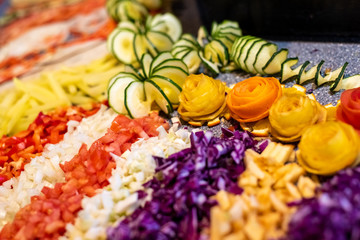 Fresh slice of vegetables, red pepper, carrots, cabbage and onion