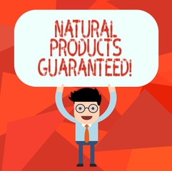 Conceptual hand writing showing Natural Products Guaranteed. Business photo text foods that does not contain artificial flavours Man Holding Above his Head Blank Rectangular Colored Board