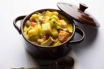 Navratan Korma is a rich, creamy and flavorful Mughlai dish  from India that literally translates to nine-gem curry. The “gems” are the fruits, vegetables and nuts that make up the curry. 