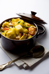 Navratan Korma is a rich, creamy and flavorful Mughlai dish  from India that literally translates to nine-gem curry. The “gems” are the fruits, vegetables and nuts that make up the curry. 