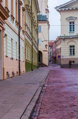 Stylish and cozy Universiteto street in Old Town of Vilnius. Classical European architecture street design