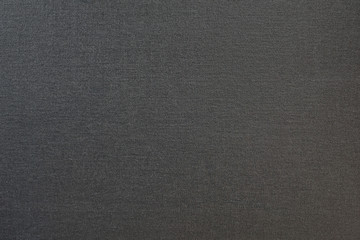 Dark gray textured fabric. Close-up. Background
