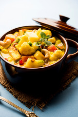 Navratan Korma is a rich, creamy and flavorful Mughlai dish  from India that literally translates to nine-gem curry. The “gems” are the fruits, vegetables and nuts that make up the curry. 
