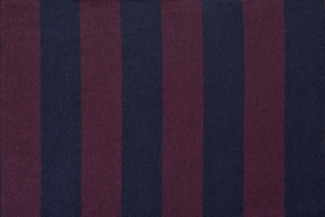 Fototapeta premium Maroon with blue striped fabric. Close-up. Background
