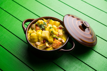 Navratan Korma is a rich, creamy and flavorful Mughlai dish  from India that literally translates to nine-gem curry. The “gems” are the fruits, vegetables and nuts that make up the curry. 
