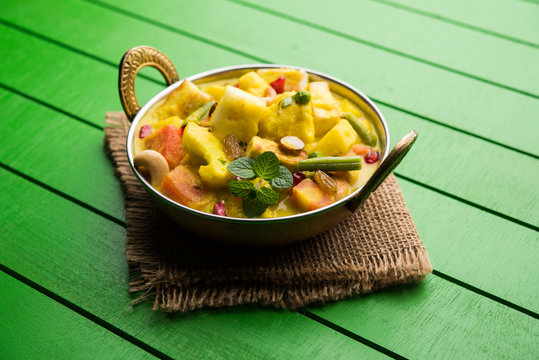 Navratan Korma is a rich, creamy and flavorful Mughlai dish  from India that literally translates to nine-gem curry. The &ldquo;gems&rdquo; are the fruits, vegetables and nuts that make up the curry. 