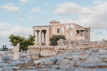 Obraz premium The Erechtheion or Erechtheum is an ancient Greek temple on the Acropolis of Athens in Greece which was dedicated to both Athena and Poseidon. 