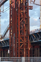 Fototapeta na wymiar Metal construction unfinished bridge in Kiev on Ukraine.