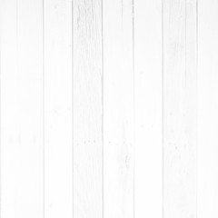 White wood surface with long boards lined up. Light wooden planks on a wall or floor with grain and neutral flat faded tones.