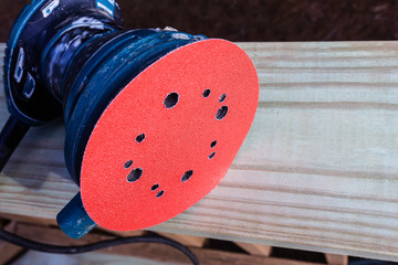 orbit sander in wooden toprail